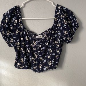 Blue floral print short sleeve. Size medium